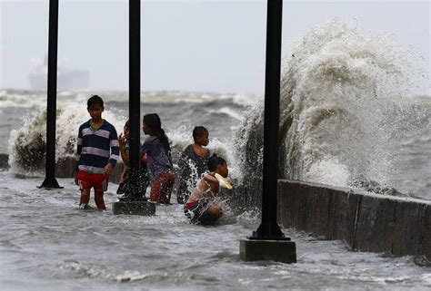 Monsoon rains flood parts of Metro Manila .